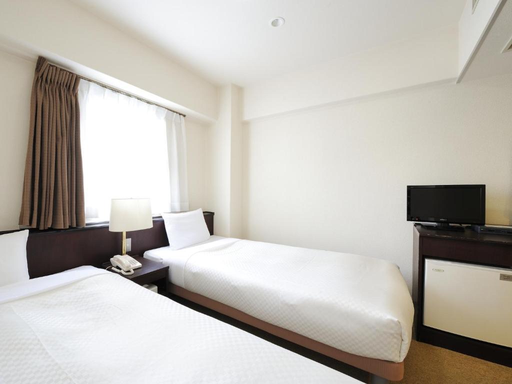 Sendai Business Hotel Ekimae Pokoj fotografie